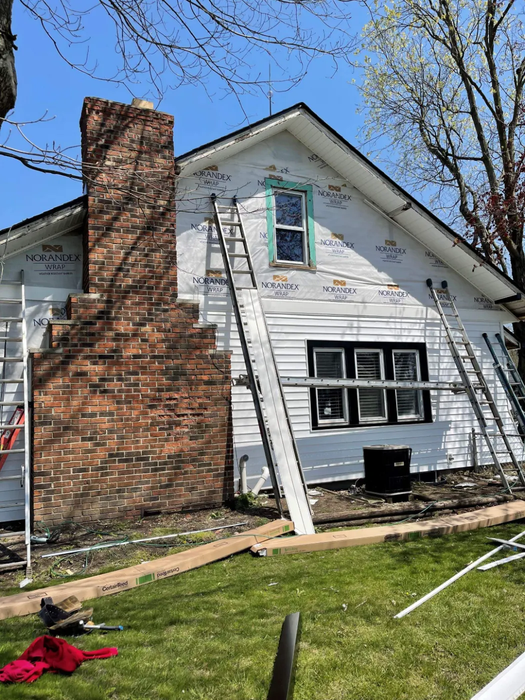 Siding installation documented in Keeneland Park